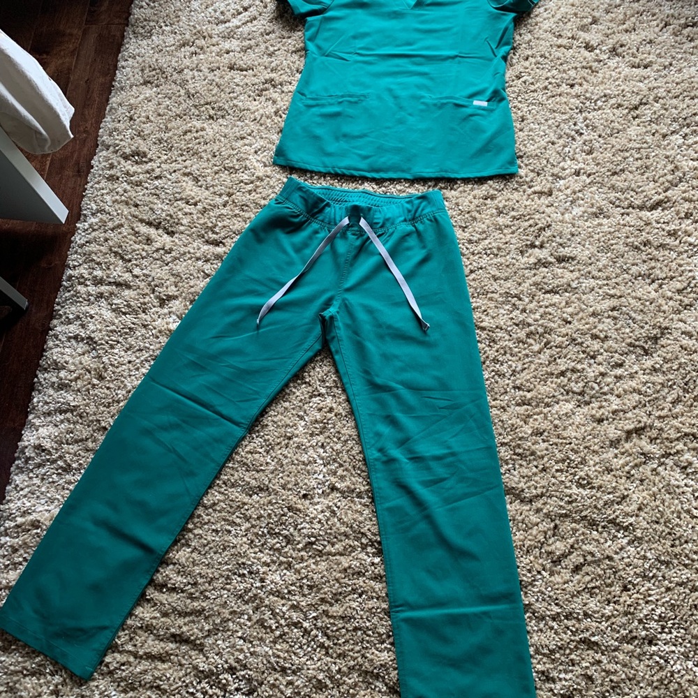 Gently used set of Figs scrubs